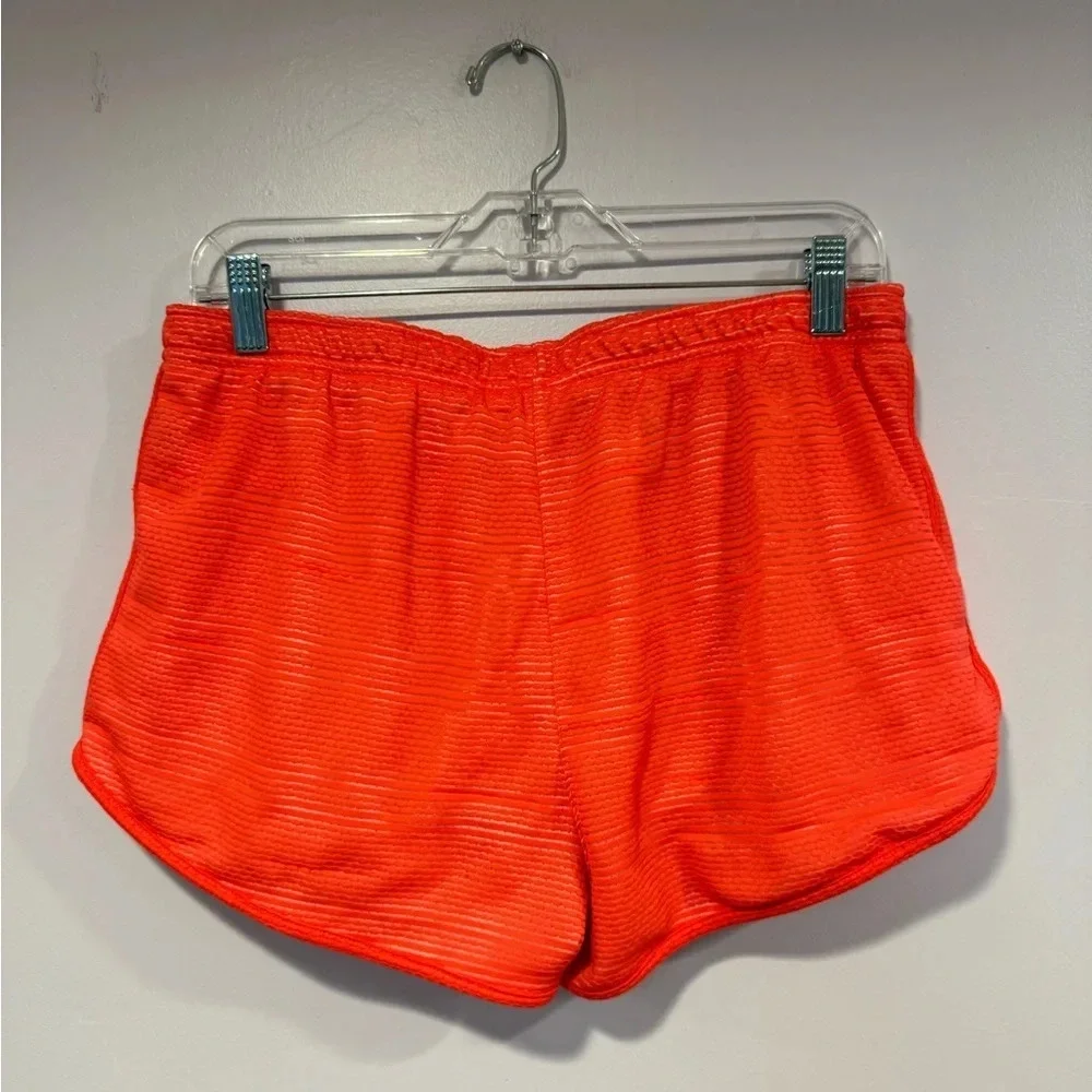 Coral ribbed Nike shorts‎